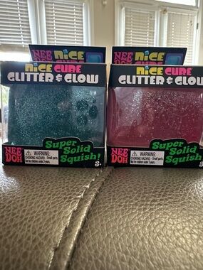 NeeDoh Cube Glitter & Glow squishes  Pink & Teal